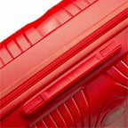 Detalle del asa lateral y del logo GYL en la maleta Signature roja. #couleur_rojo