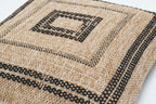 Funda de cojín rectangular negra con efecto yute natural Alfombras Nazar