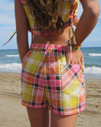 pantalones cortos dorados