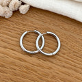 Pendientes aros “Filo” acero plateado