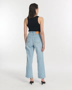 Women's jeans in light blue lightweight denim, wide, straight cut, 100% cotton material offering comfort suitable for all body shapes.
