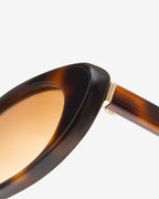 Close-up of the acetate butterfly frame of the Mira Ecaille sunglasses
