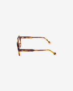 Flora Ecaille eyeglasses — round acetate frame, profile view