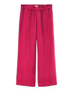 Women's pants in cherry red tencel, wide and fluid cut with elasticated waist for optimal comfort and a casual style.