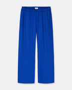 Pantalon femme en Tencel bleu profond, tissu fluide et léger, taille élastiquée, coupe droite ample pour un confort idéal adapté à toutes les morphologies.