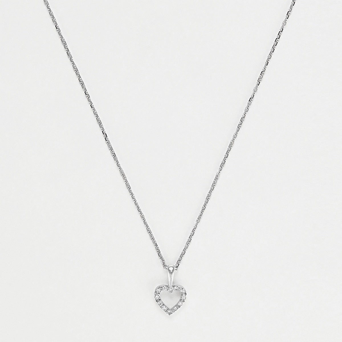 Pendentif "Mini Coeur"  D:0,04Ct/12