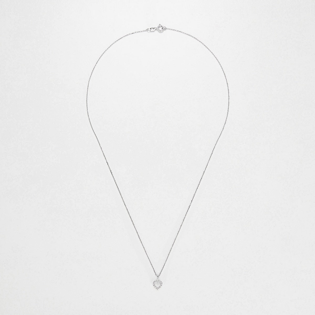 Pendentif "Mini Coeur"  D:0,04Ct/12