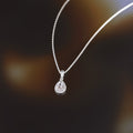 Colgante “Gota Brillante” Oro blanco 375/1000 y Circonio