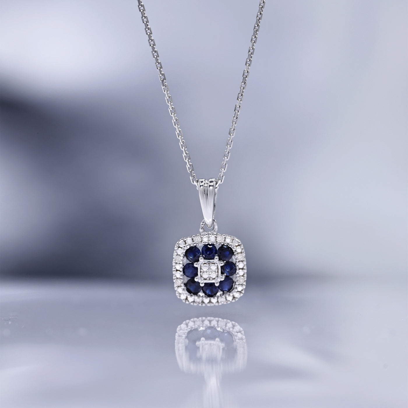 "Volga" Pendant with 0.03/8 Diamonds &amp; 0.58/8 Sapphire - 375/1000 White Gold
