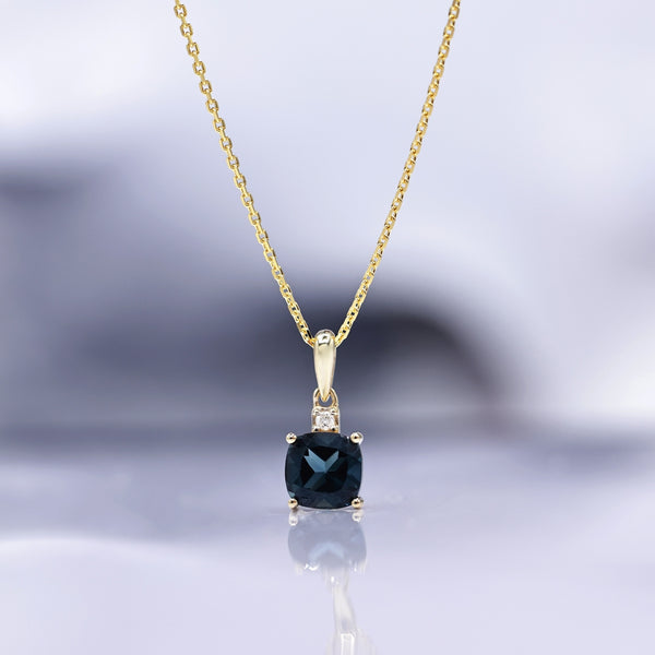 "Tonga" Pendant D0.016/1 &amp; London Blue Topaz 1.32/1 - 375/1000 Yellow Gold