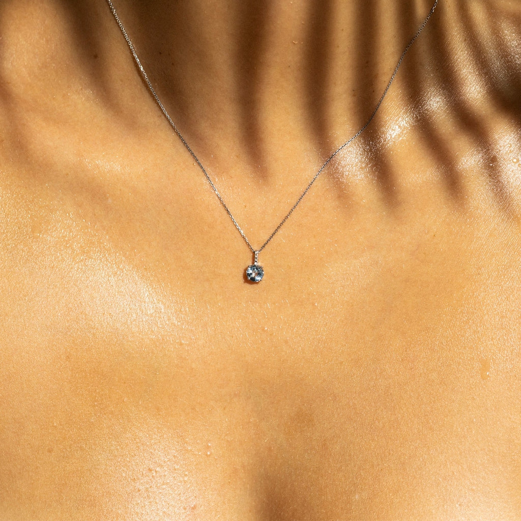 Colgante "Blue Light" Diamante 0,01/2 Topacio 0,95/1