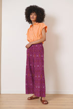 Pantalon droit aux jambes larges avec élastique au dos et deux poches italiennes bas tissu Ikat pour femme 