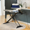 Table à repasser pliable TIFFANY en aluminium 130x47 cm hauteur réglable jusqu’à 100 cm avec repose-fer et support centrale vapeur