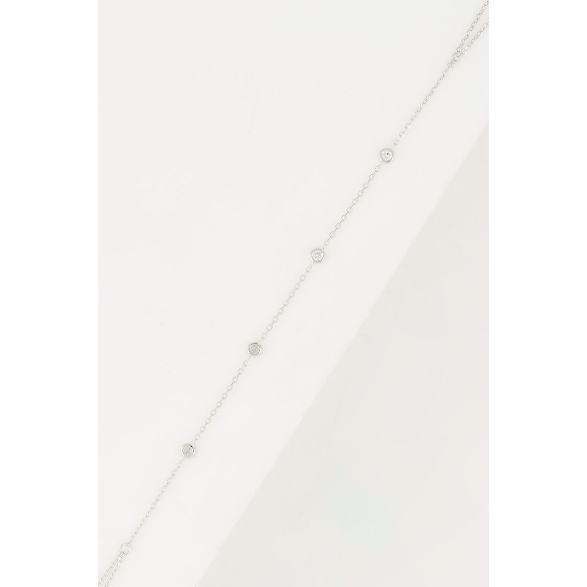 Pulsera “Tiyi” D0.09/4 – Oro Blanco