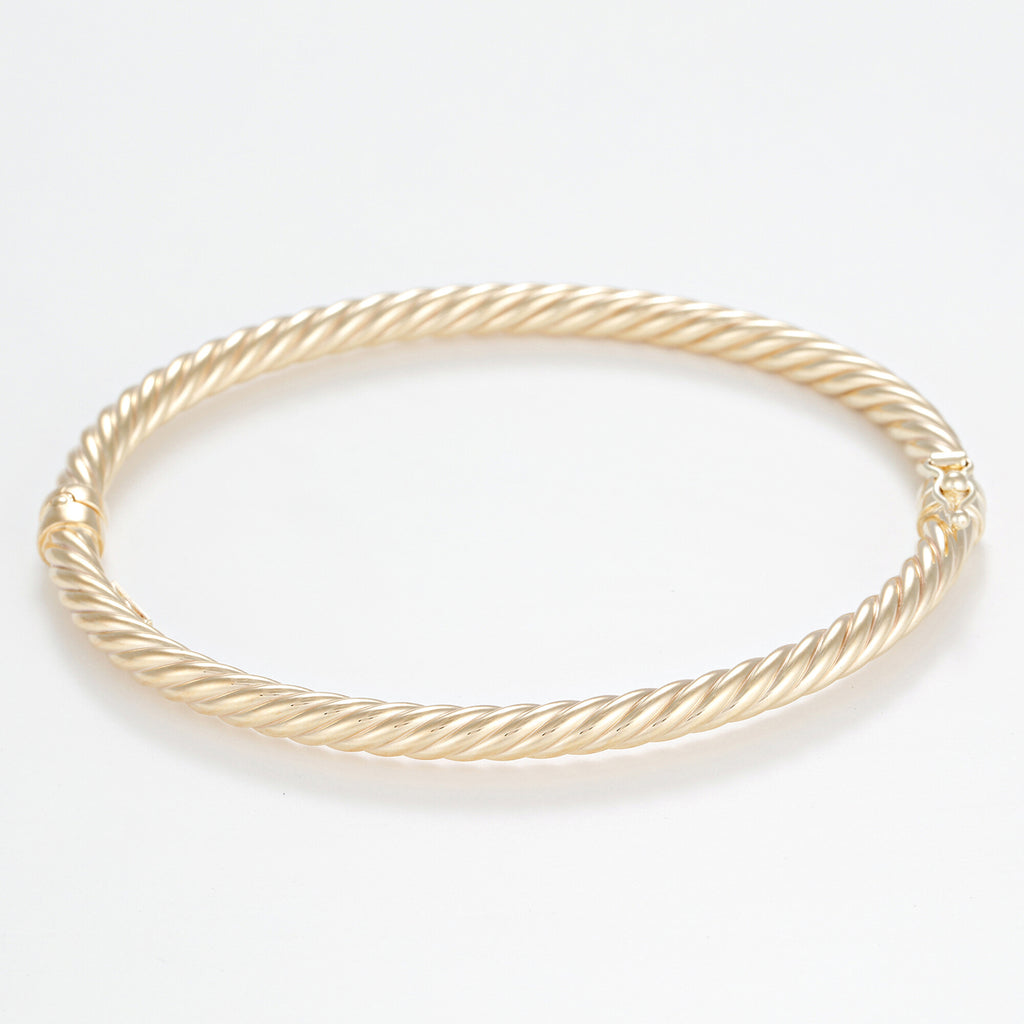 Twisted bracelet in 375/1000 yellow gold