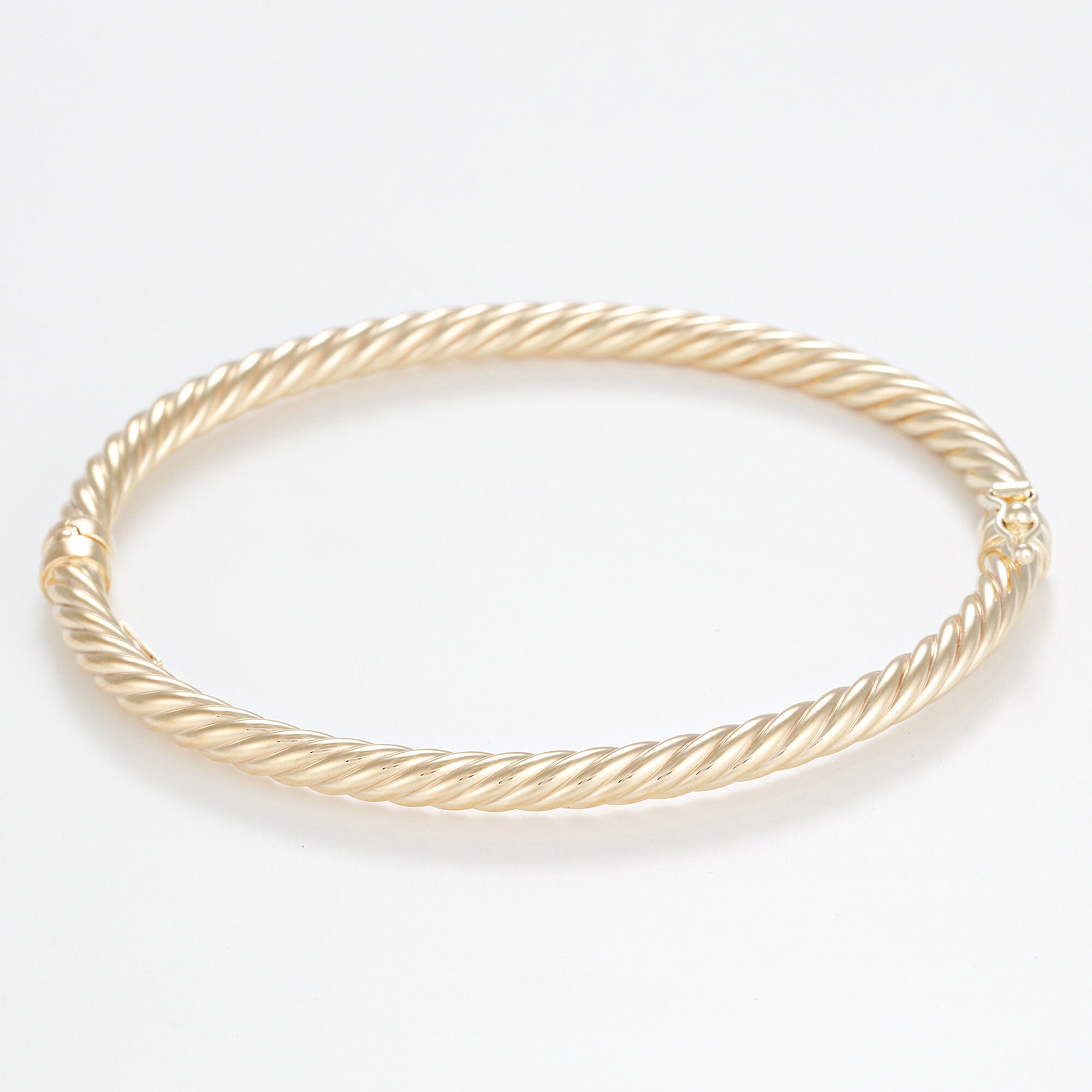 Twisted bracelet in 375/1000 yellow gold