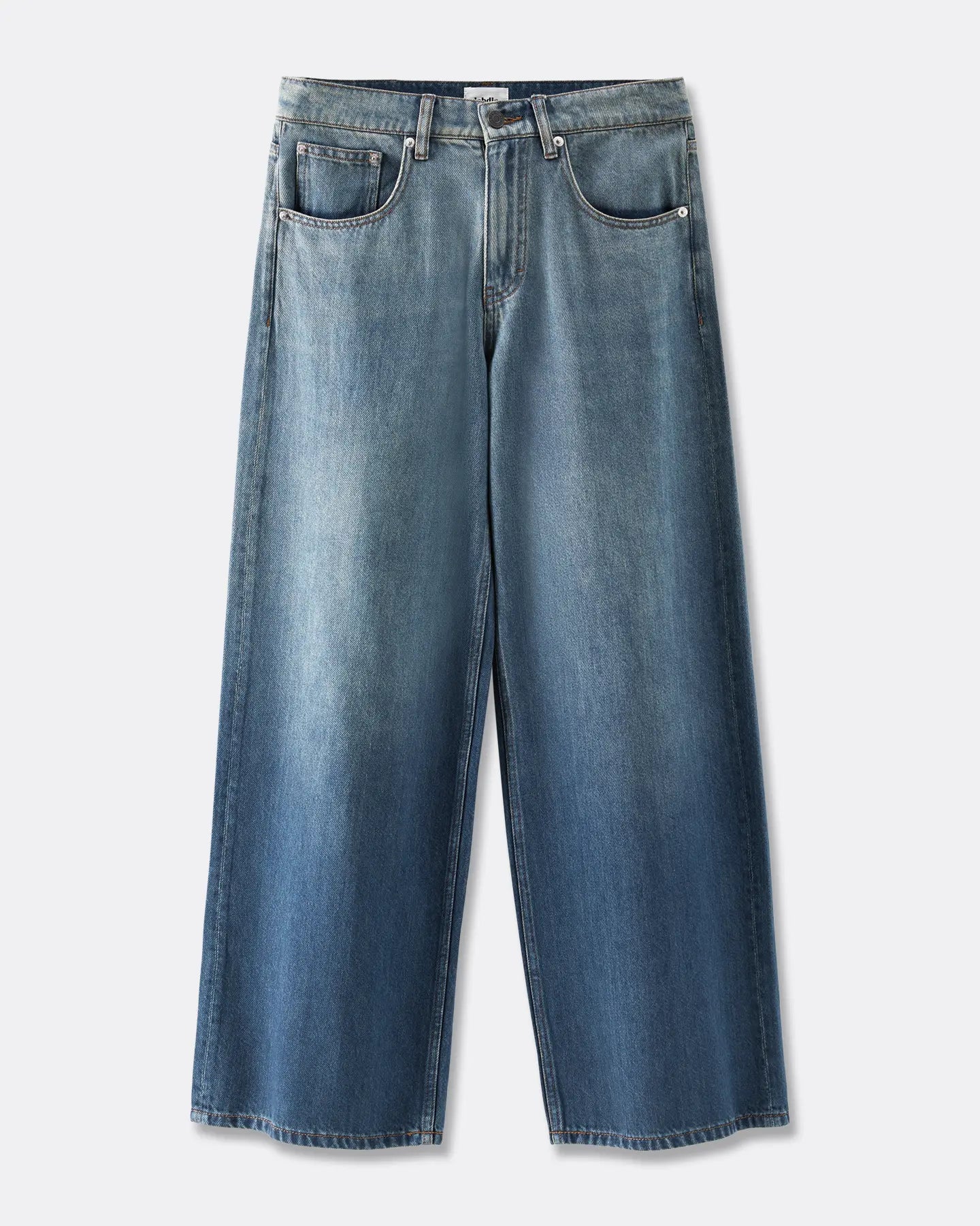 Vaqueros de mujer confeccionados en denim Tencel azul lavado con corte amplio y recto, que ofrece comodidad, ligereza y adaptabilidad a todas las morfologías.