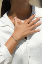 Bracelet "Comme Une Feuille" D0,21/40 - Or Blanc 375/1000