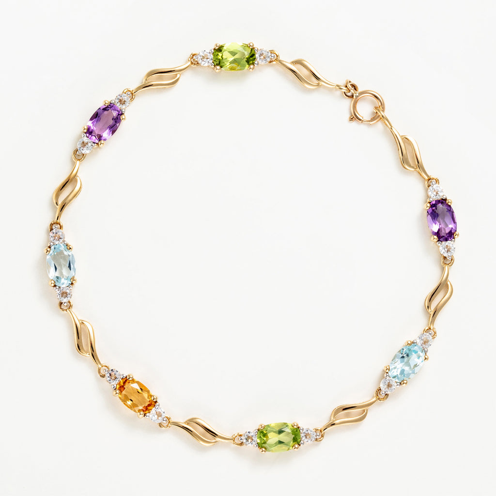 Brazalete “Mon Arc En Ciel” Top blanco 0,92/14; Tapa azul 1,4/2; Amatista 0,9/2; Peri - Oro amarillo 375/1000