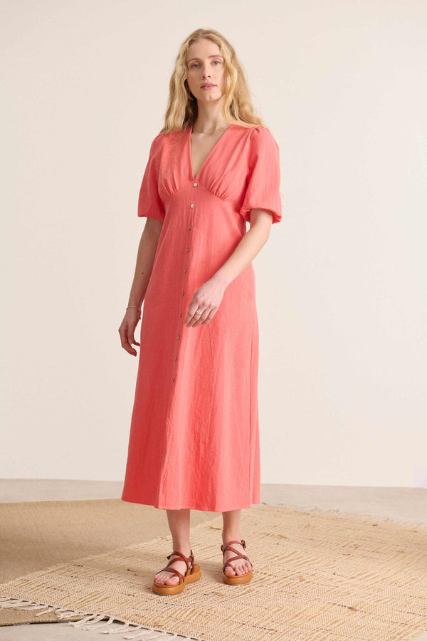 Midi length dress, 2/4 elasticated and slightly puffed sleeves, dress with slit at the front 