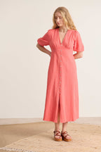 Long flowing dress ideal for summer with V-neck cutouts, front slit and invisible zipper 