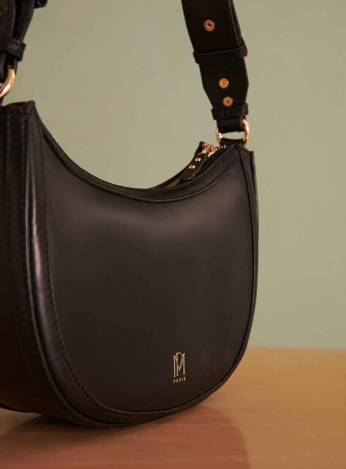 SAULA LEATHER HALF MOON BAG PETITE MENDIGOTE