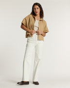 Jean blanc en denim stretch 100% coton, coupe droite et confortable qui s'adapte à toutes les morphologies, idéal pour un style décontracté et élégant.