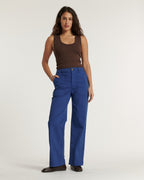 Ultramarine blue cotton jeans with straight cut and high waist, offering a comfortable fit and a silhouette suitable for all body shapes.