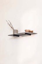 Wandregal LENN in modern Design with decorative objects in black metal, one wall.