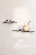 Wandregal LENN in modern Design with minimalist Forms and decorative Elements.
