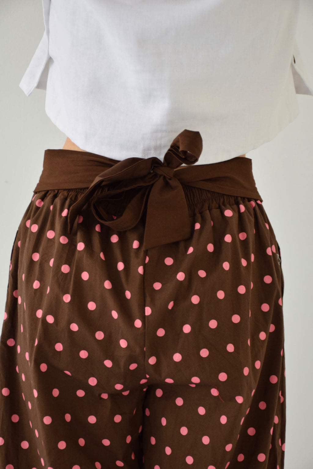 Pantalones Lia de lunares en marrón y rosa