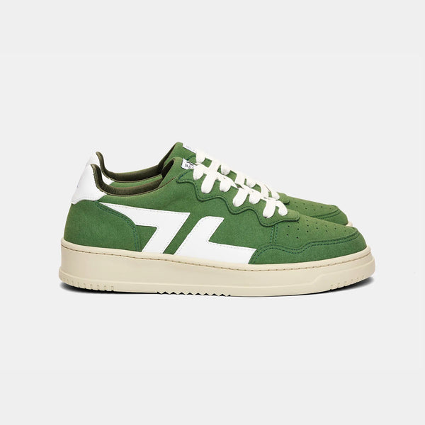 Vista lateral de las zapatillas verdes ZETA B3, mostrando su diseño minimalista y su silueta moderna.