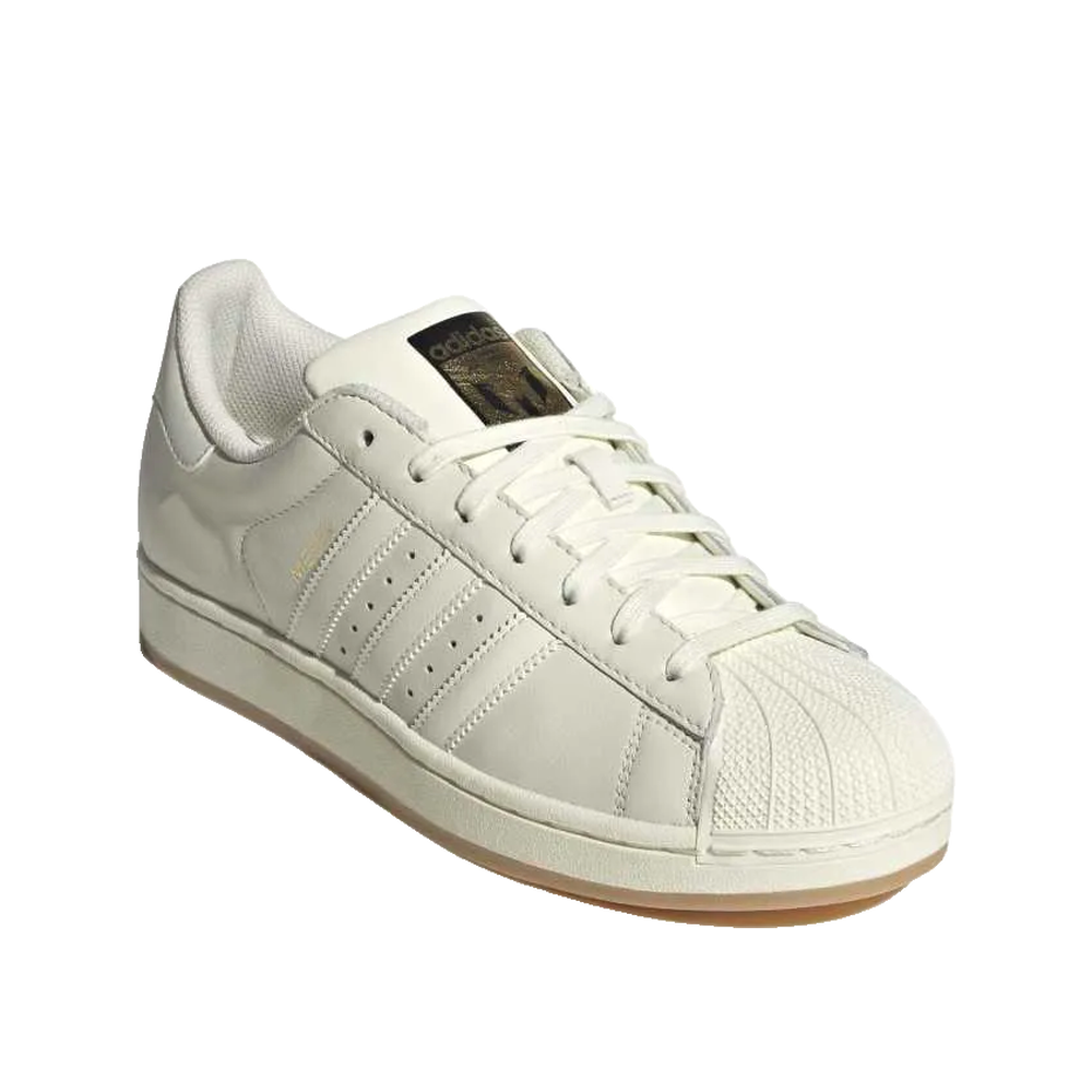 Adidas Superstar Messi – Unisex-Sneaker Elfenbein/Gold