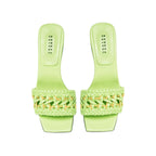 Almeria Avocado Mid-Heel Sandal showcasing a sleek design with a braided strap in soft avocado leather.