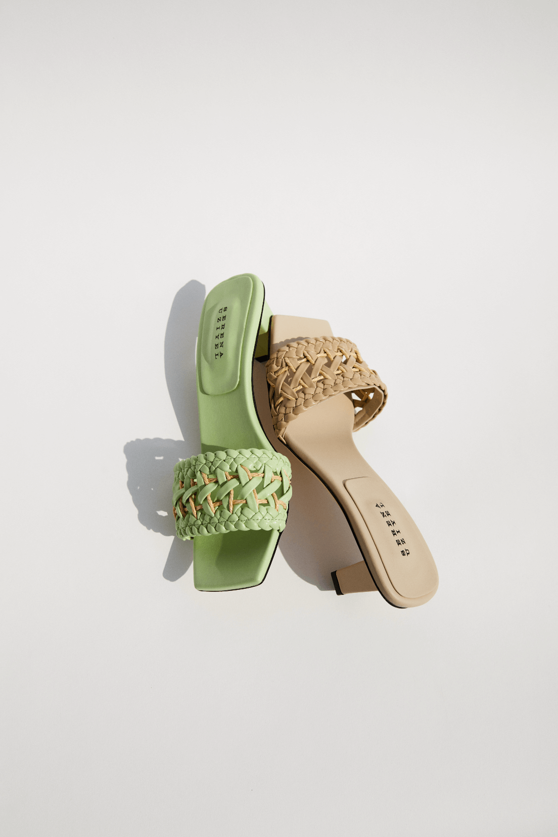 Almeria avocado mid-heel sandals showcasing open toe and braided strap design in green and beige leather.