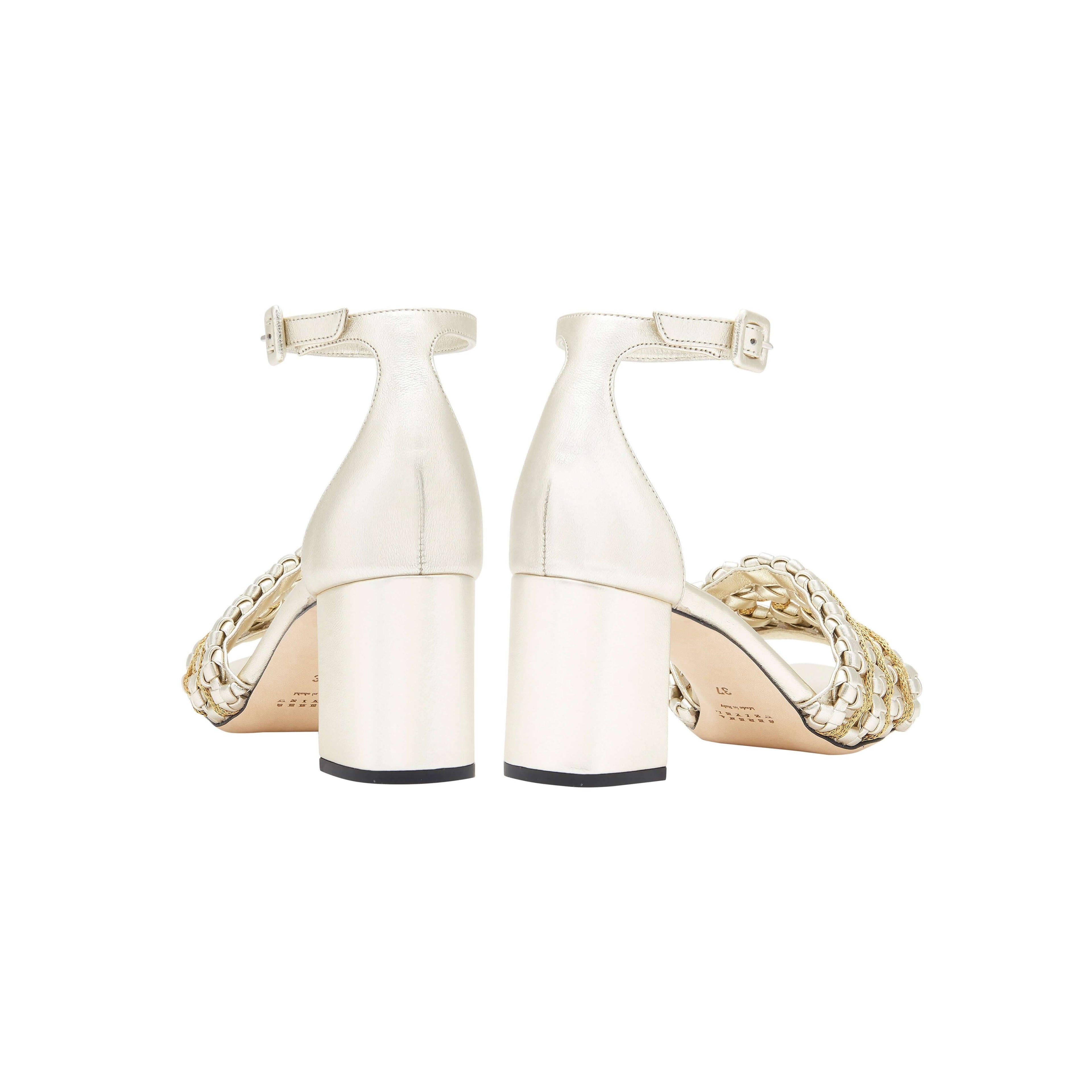 Aurnia Sahara block ankle sandals showcasing a 50MM heel, open toe design, and elegant ankle strap in sahara leather.