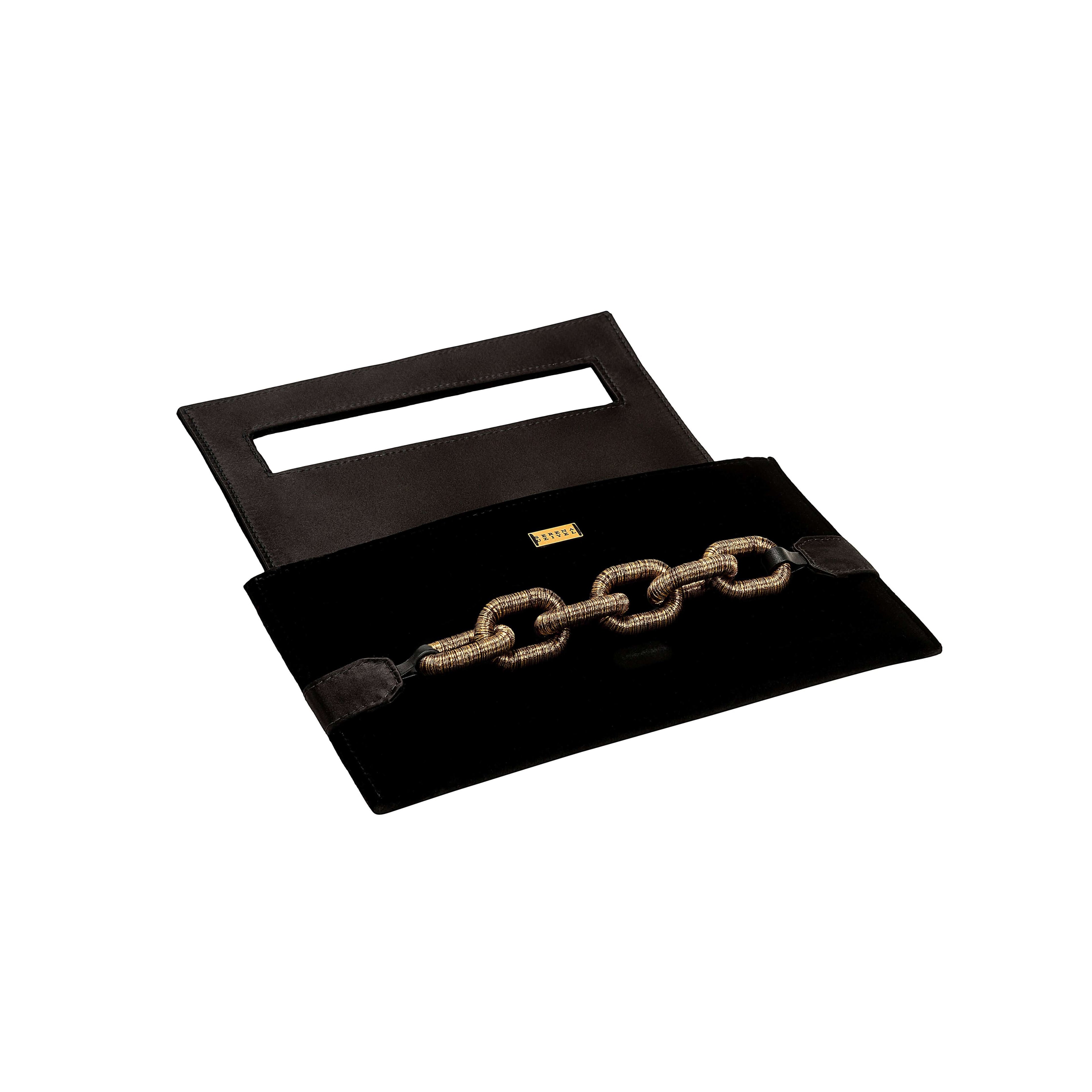 Catena Black Envelope Clutch made of velvet with antique gold chain detail, perfect for elegant occasions.