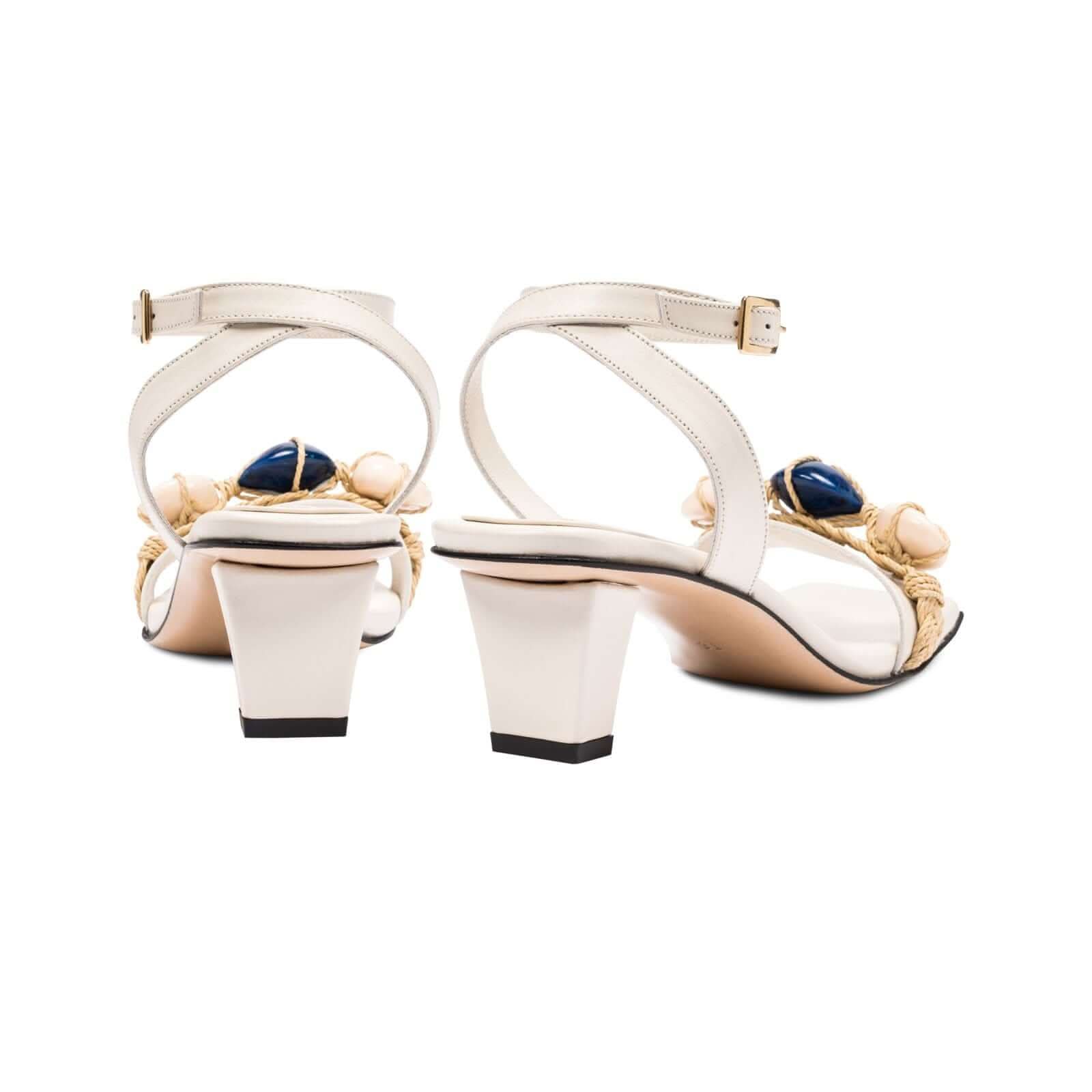 Delphine 50MM Ankle Cross Sandals featuring earthy colors and aqua beads, showcasing a stylish back view with block heel.