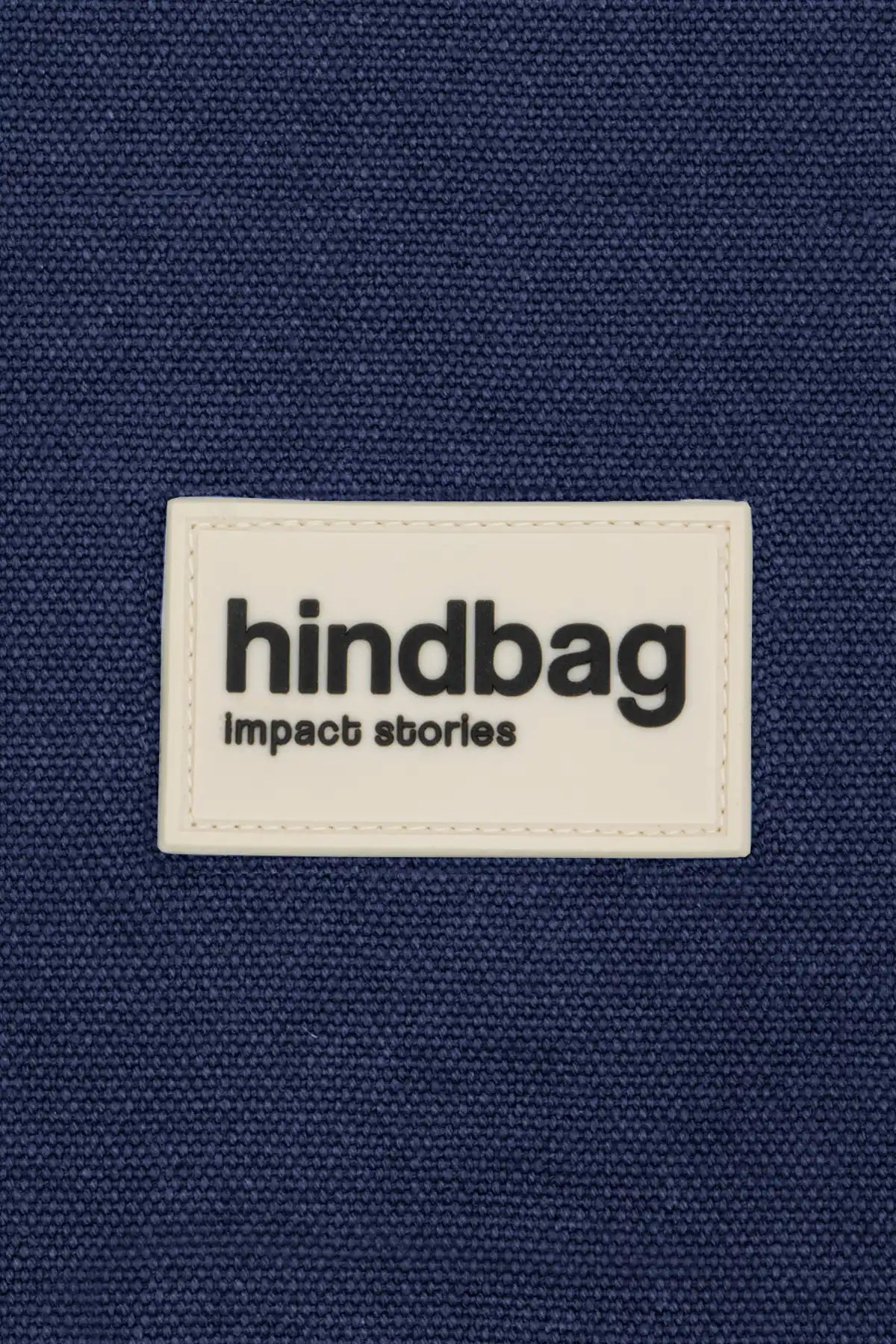 Inzoomning etikett hindbag silikon marinblå 