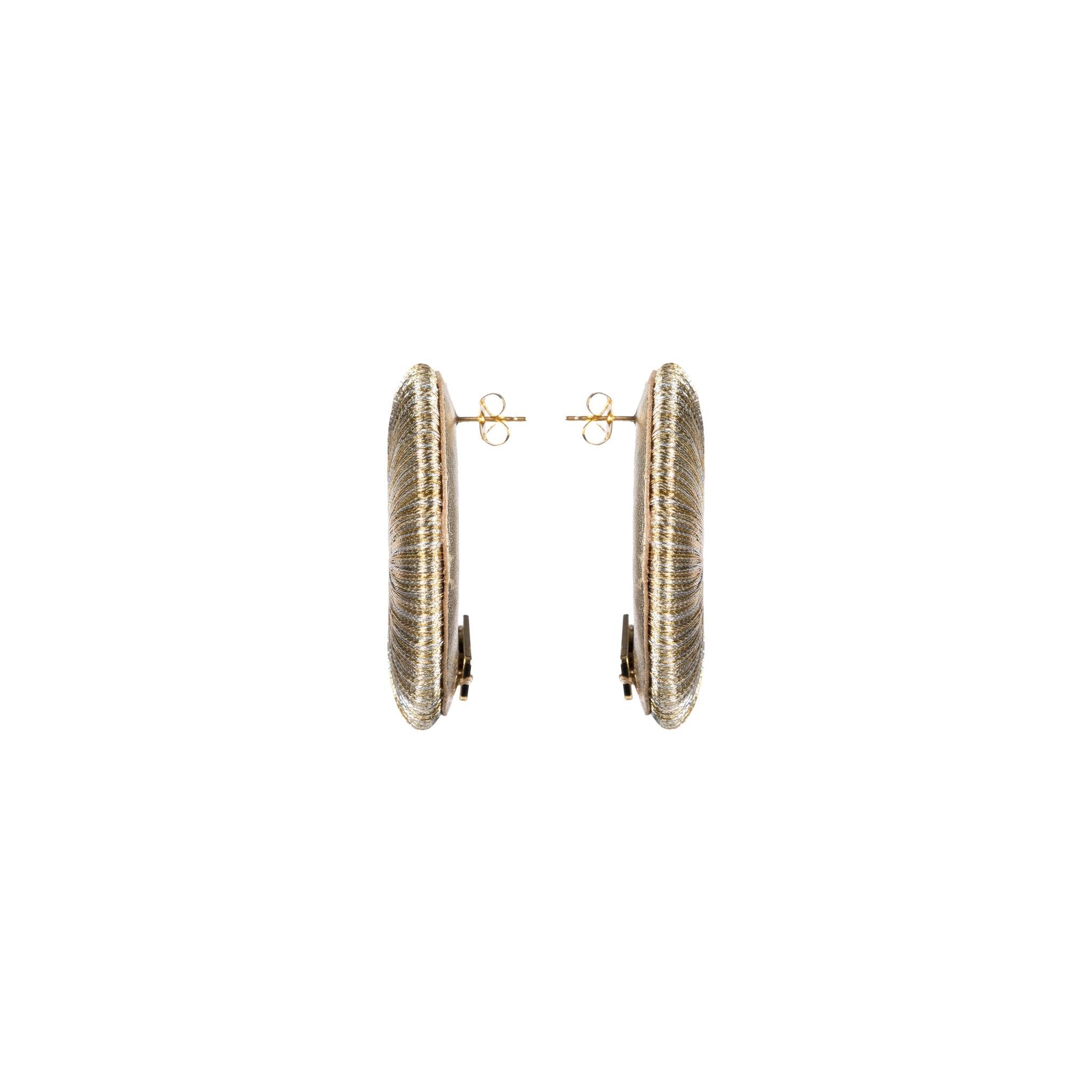 Close-up view of Boho Gold Silver Earring showcasing intricate hand-wrapped metallic threads in circular design.