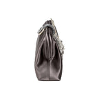 Side view of the Fiora Electrum Pouch Bag, showcasing its elegant silver flower embellishment on a satin finish.