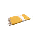 Fouta infantil personalizable amarillo mostaza colgada en el baño - BY FOUTAS