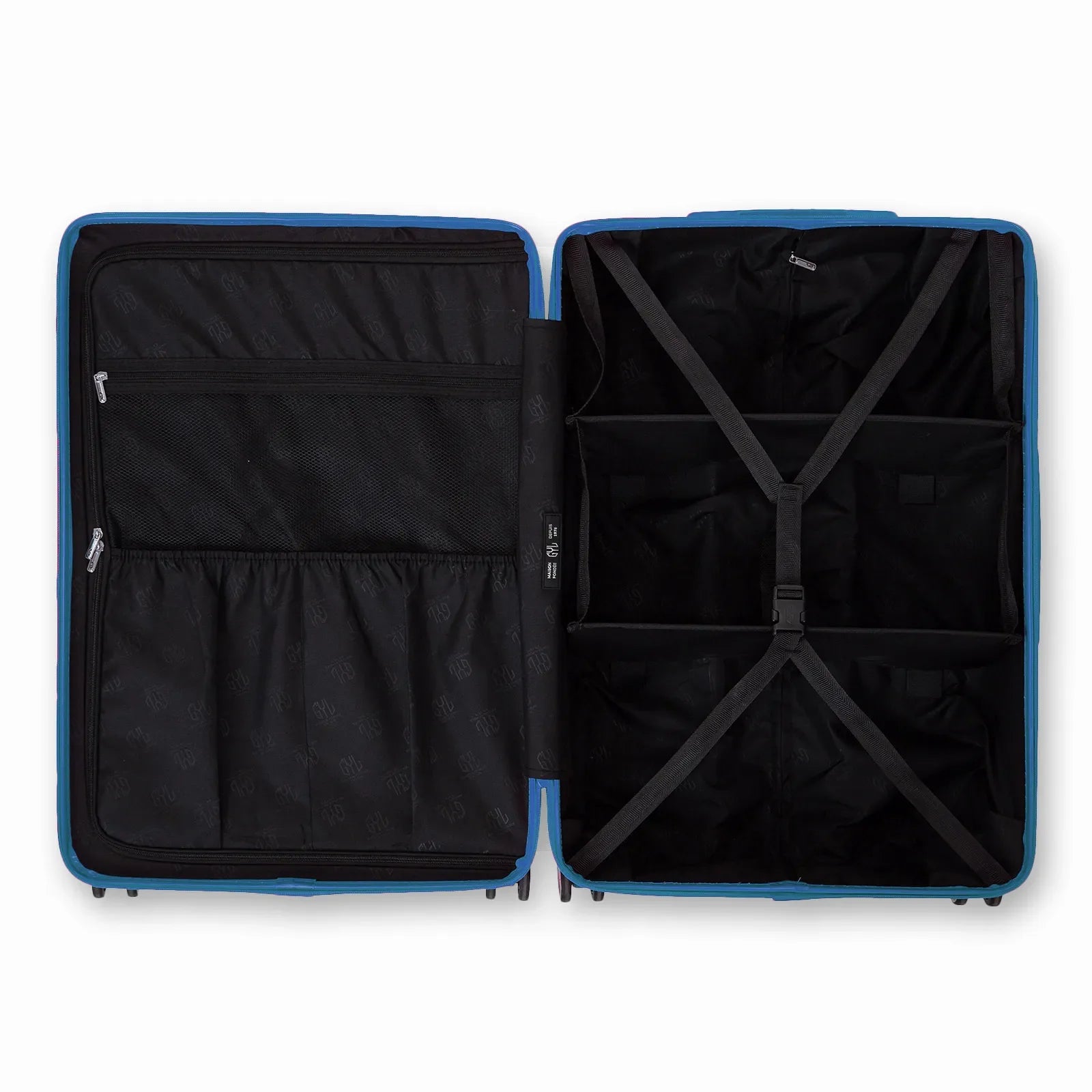 Compartmentalised interior of the GYL Intemporelle grey-blue suitcase with cross straps and mesh pockets. #couleur_bleu grisé