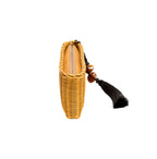 Stylish Melita Natural Clutch made from raffia, featuring a stone tassel closure, ideal for summer nights.
