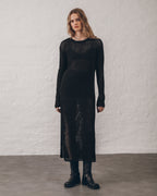 El vestido negro abierto
