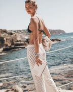 Los pantalones de crochet crudo