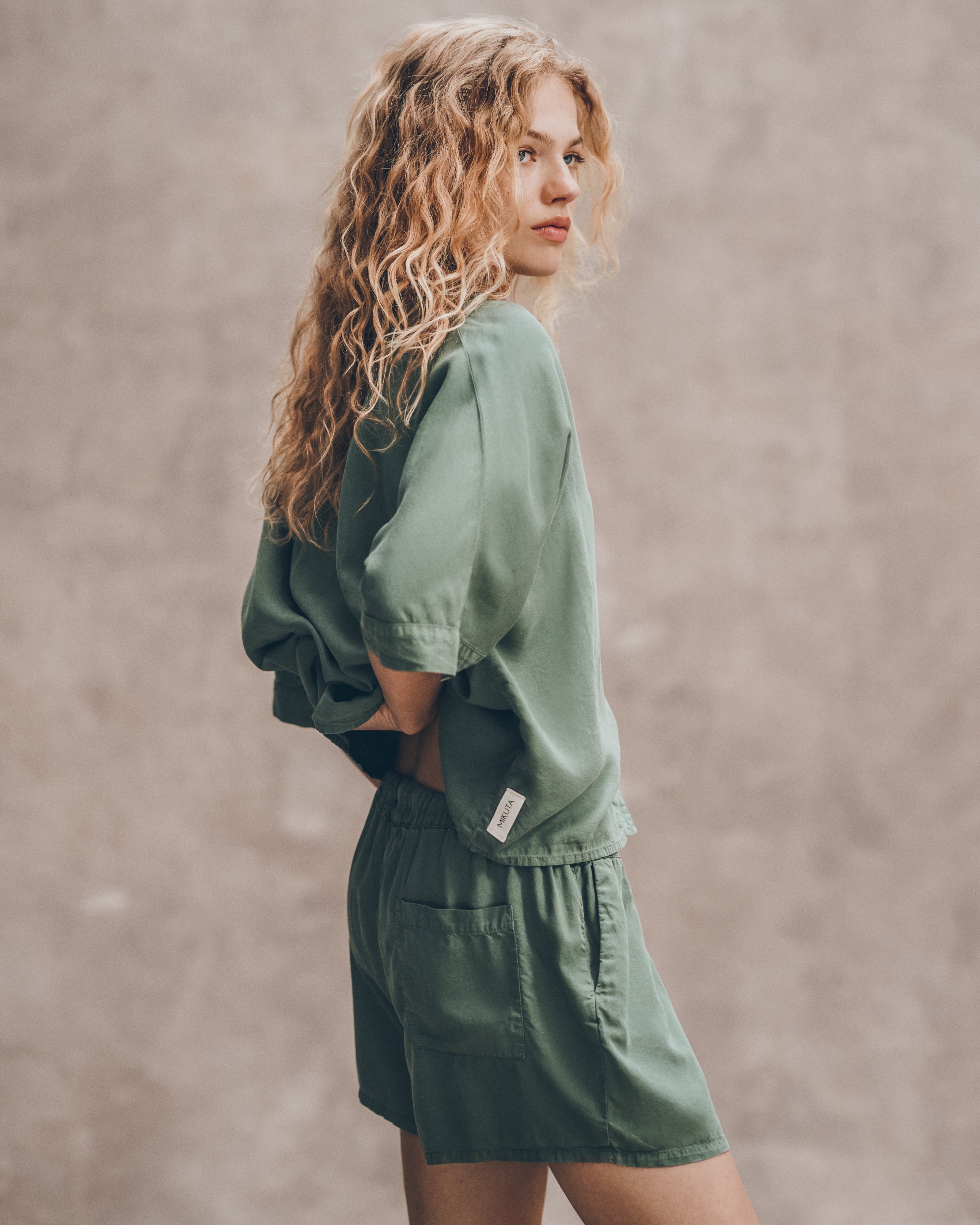 The Green Co Ord Shirt The Green Co Ord Shorts The Black Leather Buckle Sandals - Product photo