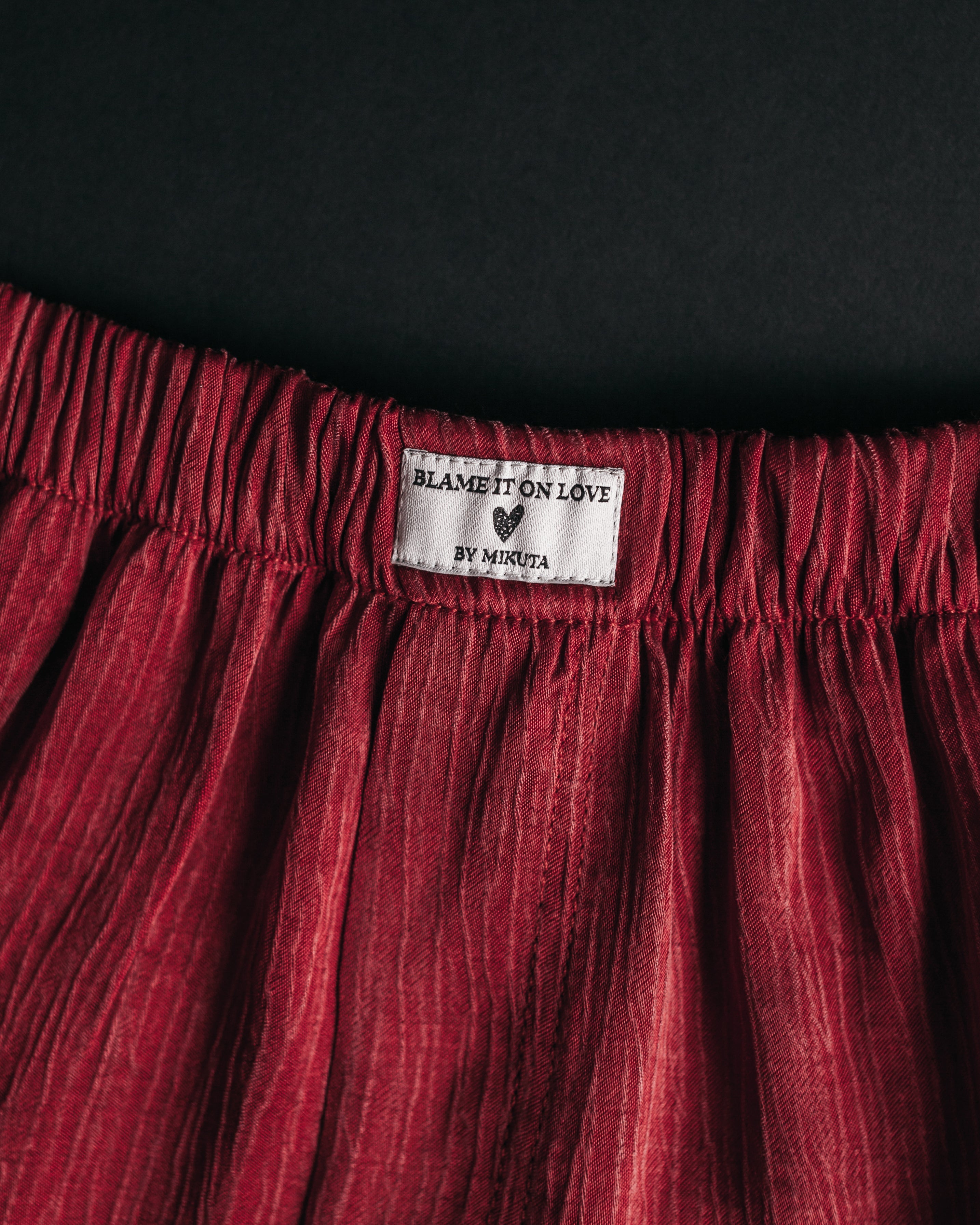 Red crinkle boxer shorts close-up - Valentine's lace sleepwear bottoms