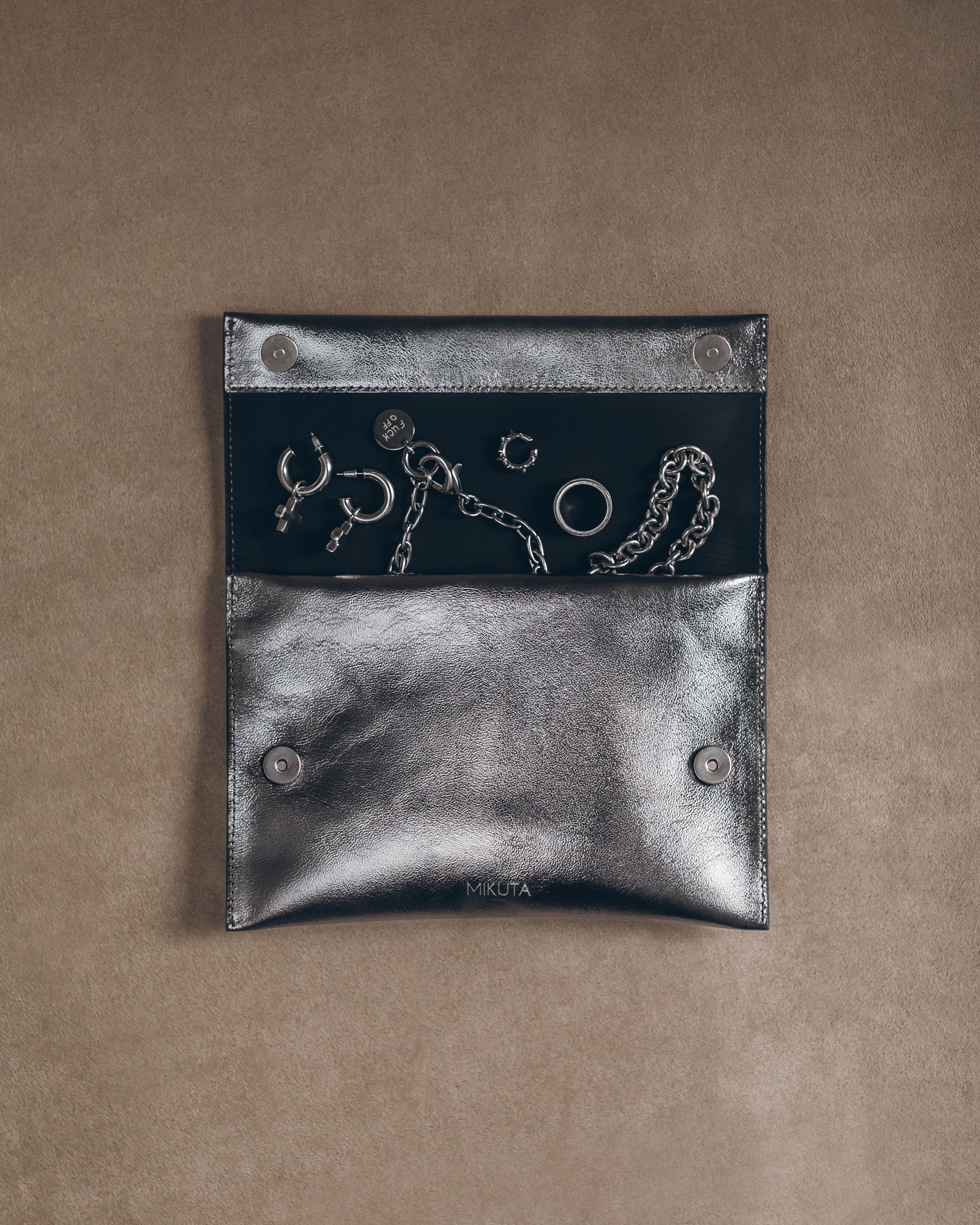 The Silver Leather Essentials Pouch Product Shot - Product photo