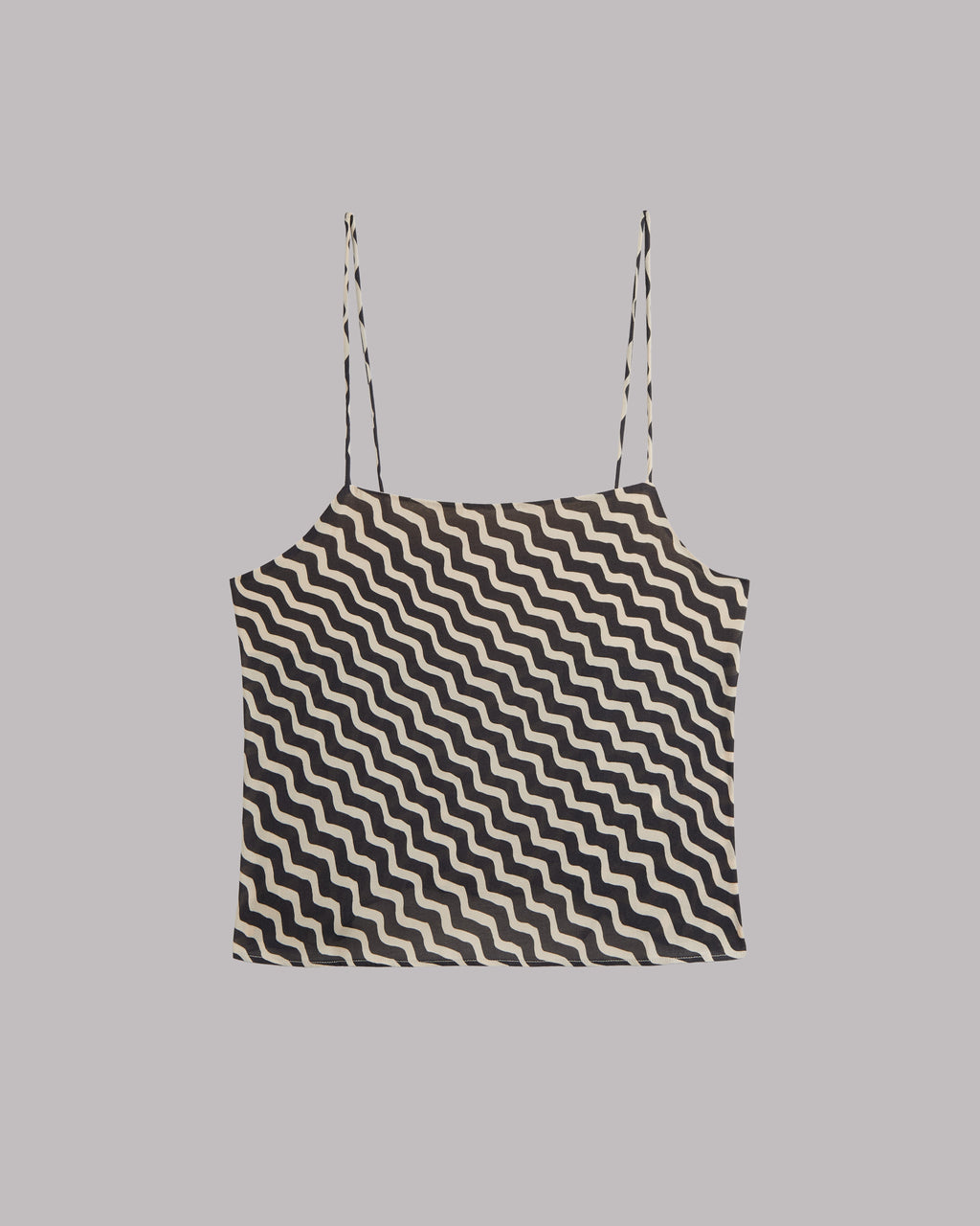 Black and white striped top on a gray background
